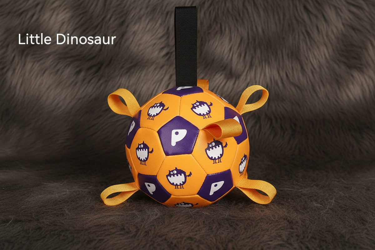 Little Dinosaur Yellow soccer ball hero shot on faux fur
