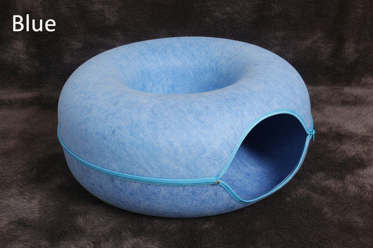 Blue felt donut cat tunnel nest hero shot on faux fur