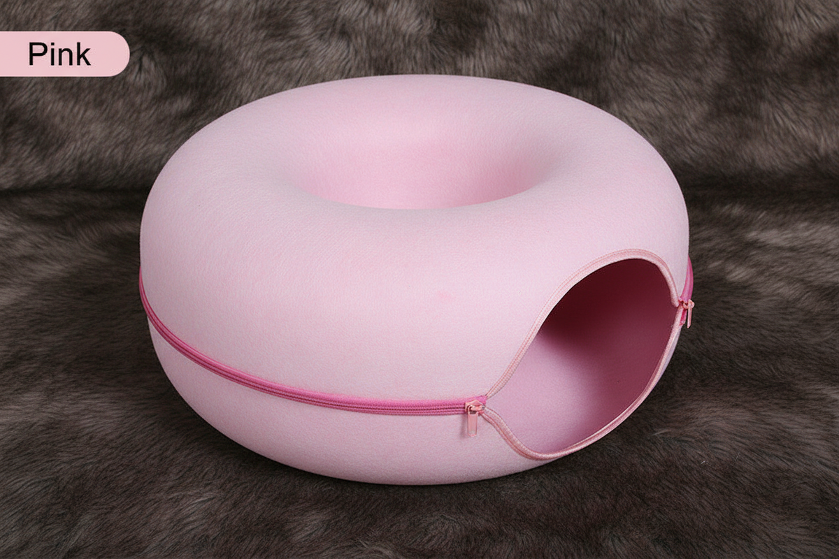 Pink felt donut cat tunnel nest hero shot on faux fur