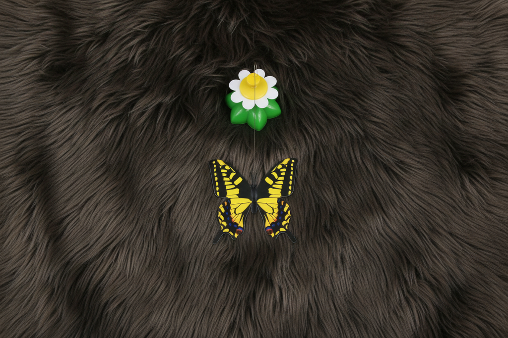 Rotating Cat Toy on Dark Fur - 4